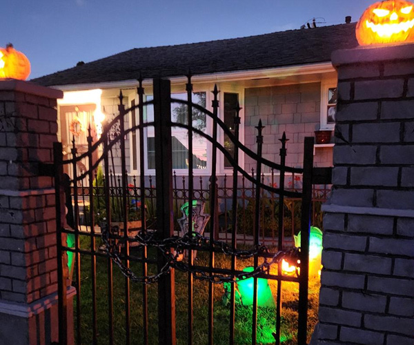 Cemetery gate at night.