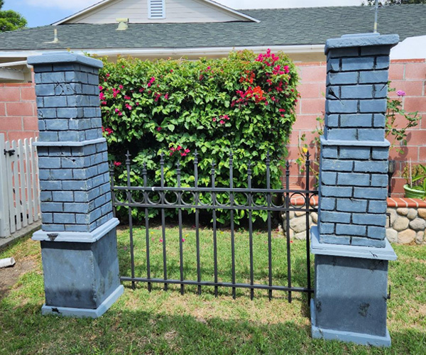 Measuring out the cemetery gate width.